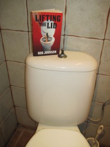 Paperback on toilet
